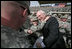 Vice President Dick Cheney greets U.S. troops and poses for pictures Tuesday, March 18, 2008, during a rally at Balad Air Base, Iraq.