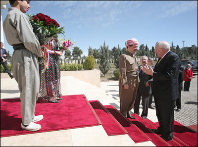 Vice President Dick Cheney is greeted by Kurdish Regional Government President Massoud Barzani Tuesday, March 18, 2008 upon arrival to the president's residence in Irbil, Iraq. The Vice President's visit to Irbil comes on the second day of an unannounced trip to Iraq where he has met with Iraqi leadership, U.S. officials and U.S. troops.
