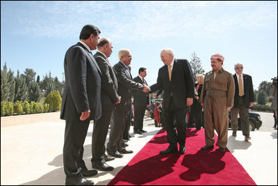 Vice President Dick Cheney greets Iraqi Kurdish officials Tuesday, March 18, 2008 upon arrival to the residence of the president of the Kurdish Regional Government in Irbil, Iraq.