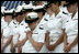 Midshipmen bow their heads during the Invocation at the Graduation and Commissioning Ceremony for the U.S. Naval Academy Class of 2006, Friday, May 26, 2006 in Annapolis, Maryland. During the ceremony Vice President Dick Cheney delivered the commencement address and awarded diplomas to the graduates.