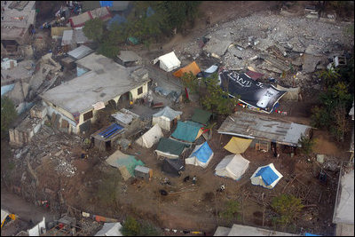 During a one-day visit to Pakistan Vice President Dick Cheney surveyed the extensive damage caused by the October 8th earthquake. The 7.6 magnitude earthquake occurred in one of the most mountainous and inaccessible regions of Pakistan and took more than 73,000 lives and left 2.8 million people homeless. The US has pledged a total of $510 million in relief and reconstruction efforts and has provided winterized shelter for over 31,000 families to date.