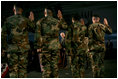 Vice President Dick Cheney administers the ceremonial oath of re-enlistment at a rally for the troops at Fort Leavenworth, Kansas, January 6, 2006. Fort Leavenworth holds the title as the oldest Army installation in continuous active service west of the Mississippi.