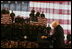 Vice President Dick Cheney participates in a rally with the troops at Scott Air Base, home of the US Transportation Command (USTRANSCOM), Tuesday, March 21, 2006. During the rally the vice president addressed the troops and thanked them for their efforts in the global war on terror. As the single manager of America's global defense transportation system, USTRANSCOM is tasked with the coordination of people and transportation assets that allows the US to project and sustain forces around the world.