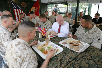 Vice President Dick Cheney talks with Marines over lunch at Camp Lejeune in Jacksonville, NC, Monday October 3, 2005.