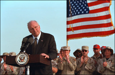 Discussing American initiatives in the war, Vice President Dick Cheney speaks to troops stationed at Al-Udeid Airbase in Qatar, March 17, 2002. "That is our first objective: To shut down terrorist camps wherever they are and to disrupt terrorist plans and to bring terrorists to justice," said the Vice President. "We'll make life very hard for them, by driving them from place to place until there is no place left to hide."