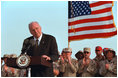 Discussing American initiatives in the war, Vice President Dick Cheney speaks to troops stationed at Al-Udeid Airbase in Qatar, March 17, 2002. "That is our first objective: To shut down terrorist camps wherever they are and to disrupt terrorist plans and to bring terrorists to justice," said the Vice President. "We'll make life very hard for them, by driving them from place to place until there is no place left to hide."