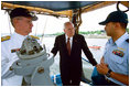 Vice President Dick Cheney talks with crewmembers aboard the Coast Guard Cutter Monomoy, June 19, 2004.