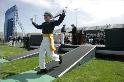 A cadet celebrates after receiving his diploma from the U.S. Air Force Academy in Colorado on Wednesday, June 1, 2005. Vice President Dick Cheney delivered the commencement address and personally congratulated the newly commissioned officers.