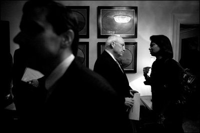 Vice President Dick Cheney talks with Secretary of State Condoleezza Rice in the West Wing, Feb. 4, 2008.