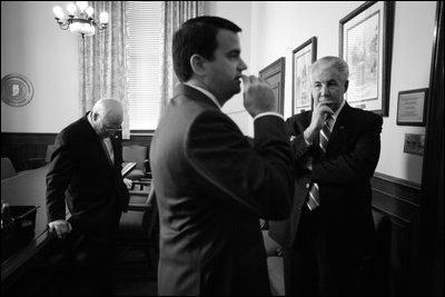 Vice President Dick Cheney, left, waits with staff and Secret Service in a hold room before a speaking engagement in Indianapolis, Nov. 1, 2007.