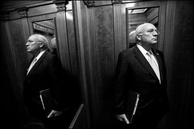 Vice President Dick Cheney is reflected in the mirror of the White House residence elevator while en route to meet with President George W. Bush, June 20, 2007.