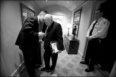 Vice President Dick Cheney confers with his Chief of Staff and Counsel David Addington in the West Wing, Jan. 24, 2008.