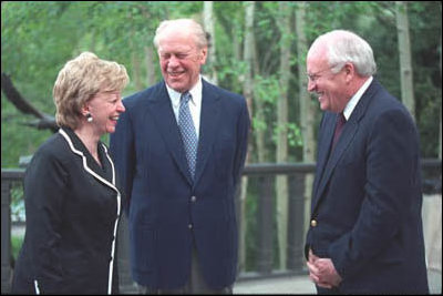 Meeting during a reception at their home, Vice President Cheney and his wife talk with their friend and his former boss, President Gerald Ford. The Vice President served as President Ford's Chief of Staff.