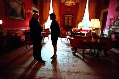 Vice President Dick Cheney and National Security Advisor Dr. Condoleezza Rice talk in the Red Room Feb. 13, 2002. 