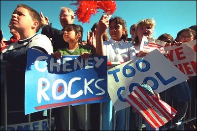 Children put their warm greetings into cool words for Vice President Dick Cheney as he disembarks from Air Force Two Feb. 20, 2002.