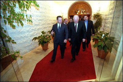 After attending a working dinner at the Al-Baraka Palace, Vice President Dick Cheney departs with King Abdullah II of Jordan March 12, 2002.