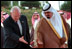 Vice President Dick Cheney and Crown Prince Abdullah of Saudi Arabia extend courtesies to each other as they enter the area where the two leaders will stand during an arrival ceremony in Jeddah, Saudi Arabia, March 16, 2002. 
