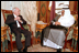 Vice President Dick Cheney talks with King Hamad Bin Isa Al-Khalifa of Bahrain at the Qudaybiyah Palace in Manama, Bahrain, March 17, 2002.