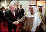 Vice President Dick Cheney jokes with First Deputy Prime Minister Sabah prior to departure from Kuwait City, Kuwait, March 18.