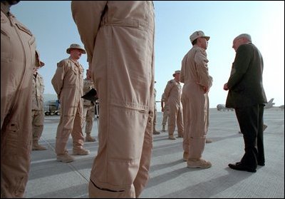 Vice President Dick Cheney thanks troops stationed at Al-Udeid Airbase for their determined effort in the war against terror in Qatar March 17, 2002. 