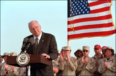 Discussing American initiatives in the war, Vice President Dick Cheney speaks to troops stationed at Al-Udeid Airbase in Qatar, March 17, 2002. 