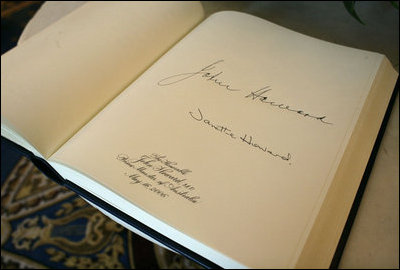 The signatures of Australian Prime Minister John Howard and his wife are recorded in a guest book at the White House Tuesday, May 16, 2006.