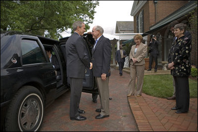 Prime Minister John Howard welcomes President George W. Bush to the Australian Ambassador's Residence Sunday, May 14, 2006.