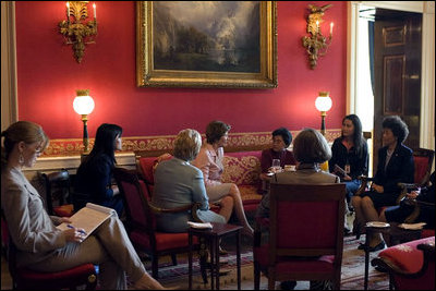 Mrs. Laura Bush hosts a tea for Madam Liu Yongqing in the Red Room on the State Floor of the White House Thursday, April 20, 2006.