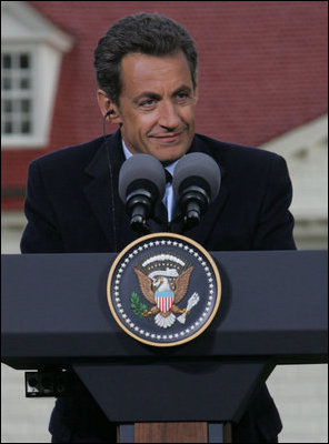 President Nicolas Sarkozy of France listens to a reporter's question Wednesday, Nov. 7, 2007, during a joint press availability with President George W. Bush at the Mount Vernon Estate in Mount Vernon, Va. President Sarkozy told President Bush, "I get the distinct sense that it is France that has been welcomed so warmly, with so much friendship, so much love... So when I say that the French people love the American people, that is the truth and nothing but the truth."