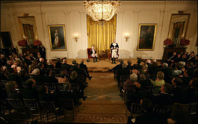 General George Washington (played by Dean Malissa) and General Marie Joseph Paul Yves Roch Gilbert du Motier, the Marquis de LaFayette (played by Benjamin Goldman), entertain the guests Tuesday, Nov. 6, 2007, in the East Room following a dinner in honor of President Nicolas Sarkozy at the White House.