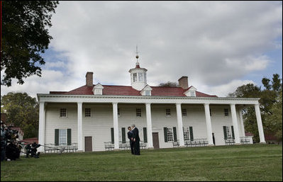 With Mount Vernon as a backdrop, President George W. Bush and President Nicolas Sarkozy of France view the Potomac as they meet Wednesday, Nov. 7, 2007, for second day.