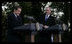President George W. Bush shares a laugh with President Nicolas Sarkozy of France as they participate in a joint press availability Wednesday, Nov. 7, 2007, at Mount Vernon, Va.