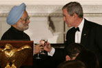 President George W. Bush and India's Prime Minister Dr. Manmohan Singh toast the evening in honor of Singh's visit, at the official dinner in the State Dining Room, Monday evening, July 18, 2005, at the White House. White House photo by Carolyn Drake