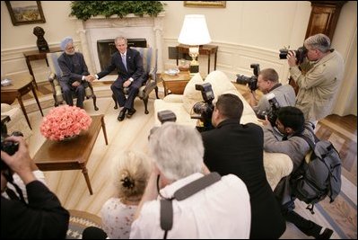 President Bush shakes hands with India's Prime Minister Dr. Manmohan Singh, Monday, July 18, 2005, during a media availability in the Oval office. 
