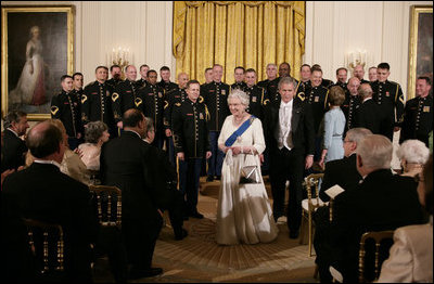 President George W. Bush escorts Her Majesty Queen Elizabeth II of Great Britain from the East Room of the White House Monday evening, May 7, 2007, at the conclusion of the State Dinner's entertainment by the U.S. Army Chorus. White House photo by Shealah Craighead