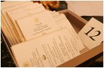 Dinner menu place cards are seen ready for placement, Wednesday, Nov. 2, 2005 at the White House, in preparation for the official dinner for the Prince of Wales and Duchess of Cornwall.