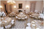 The tables are set and ready for guests, Wednesday, Nov. 2, 2005, in the White House State Dining Room, in preparation for the official dinner for the Prince of Wales and Duchess of Cornwall.