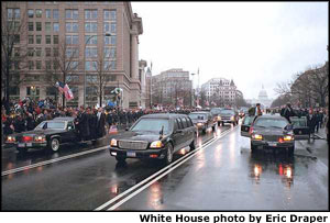President George W. Bush's motorade leads the inaugural parade to the viewing stands January 20, 2001.