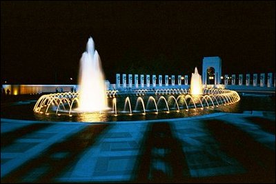 Days before its official dedication, the National World War II Memorial is depicted at night. The memorial is located between the Lincoln Memorial and the Washington Monument on the National Mall in Washington, D.C. The memorial opened in April, giving visitors an extra month to explore the mall.s newest addition before its dedication during Memorial Day weekend, May 29, 2004.