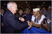 Vice President Dick Cheney greets veterans after addressing the Veterans of Foreign Wars 103rd National Convention in Nashville, Tenn., Aug. 26, 2002. .In the military, you devoted yourselves to a cause above self-interest, served with a firm sense of duty and developed personal standards that make you an example for your families and your fellow citizens. The daughter of an Army Air Corpsman described growing up with her father, and the values she learned from him without even knowing it. As she recalls, .Honesty, integrity, hard work, personal responsibility, and perseverance were all around me and I absorbed them almost imperceptibly.. Our veterans have had a similar effect on the entire nation.. said the Vice President in his remarks. 